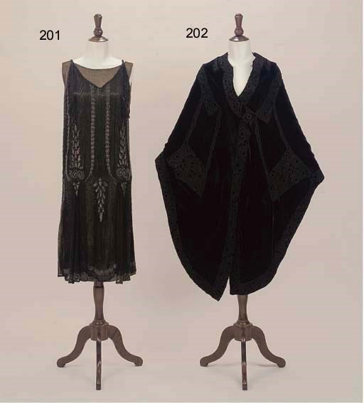 A BLACK BEADED COCKTAIL DRESS, 1920S