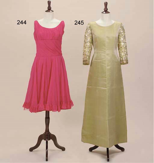 AN APPLE GREEN EVENING GOWN, BALENCIAGA