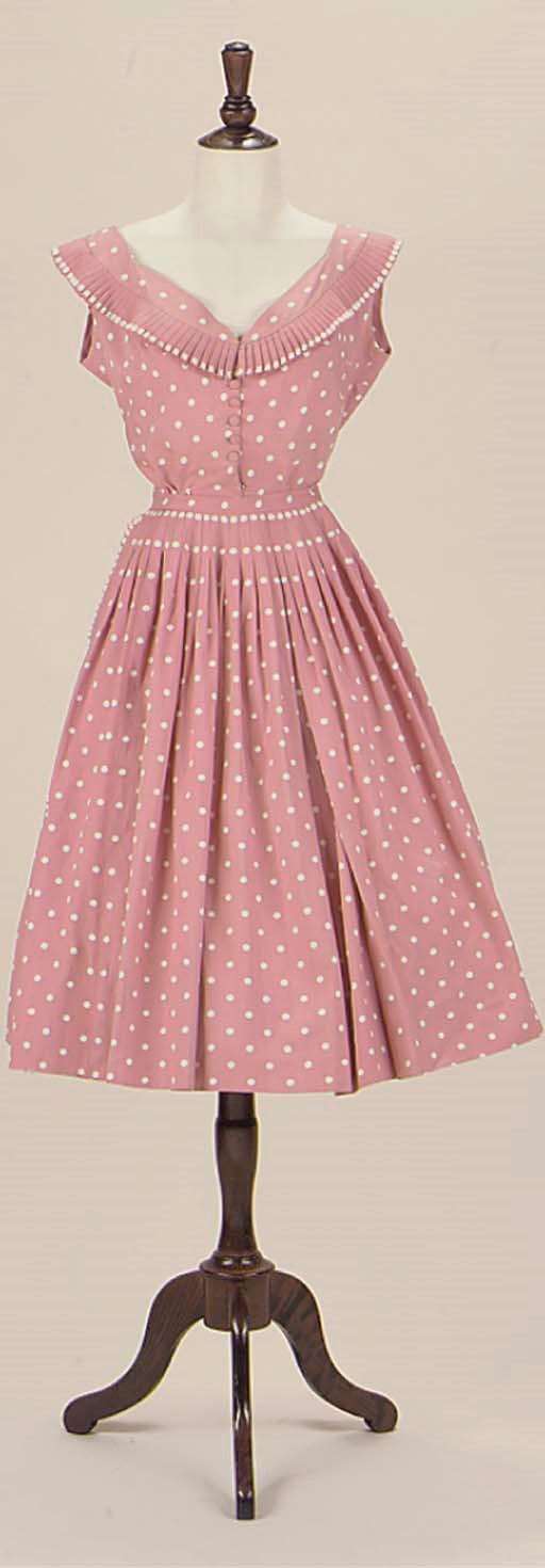 A PINK SPOTTED TWO-PIECE DRESS BY NINA RICCI