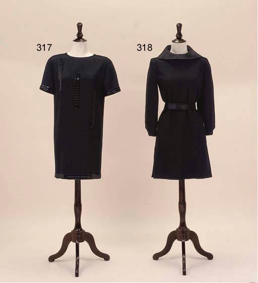 A COCKTAIL DRESS OF BLACK MOSS CREPE