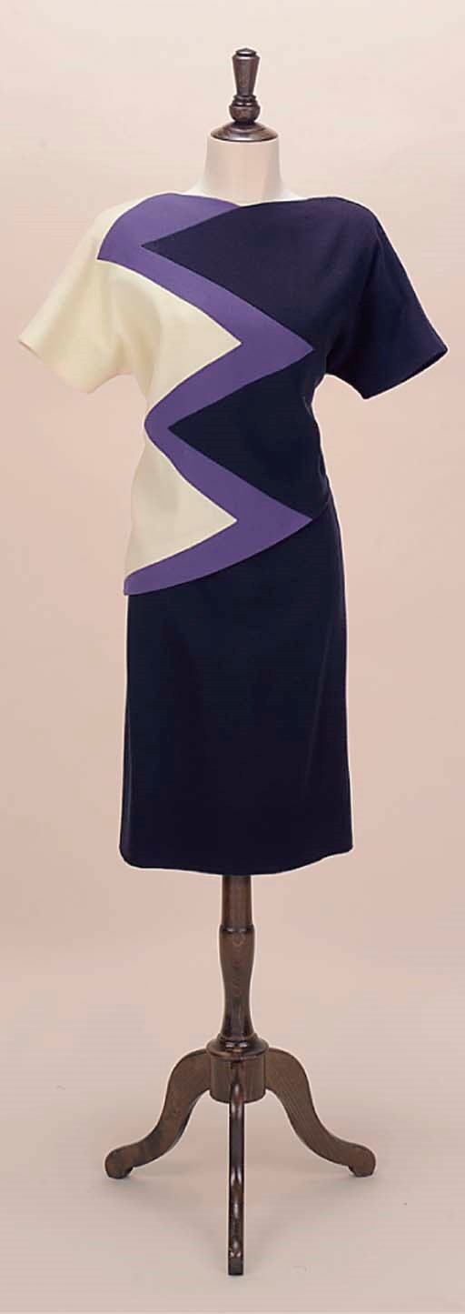 A TWO PIECE ENSEMBLE OF BLUE AND WHITE