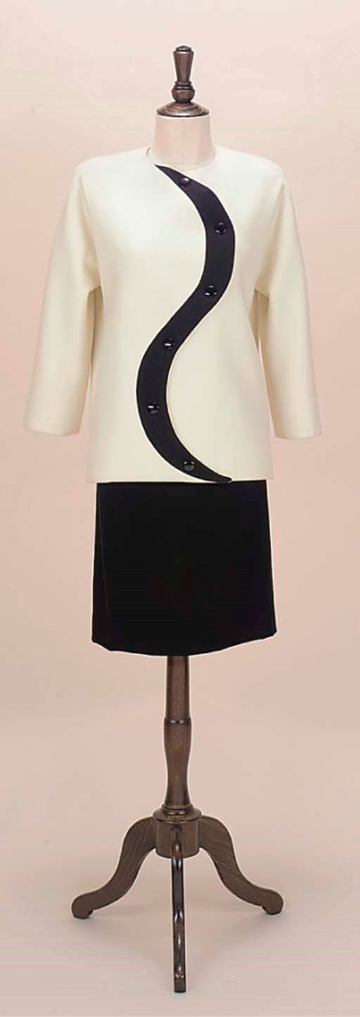 A TWO PIECE ENSEMBLE OF BLACK AND IVORY