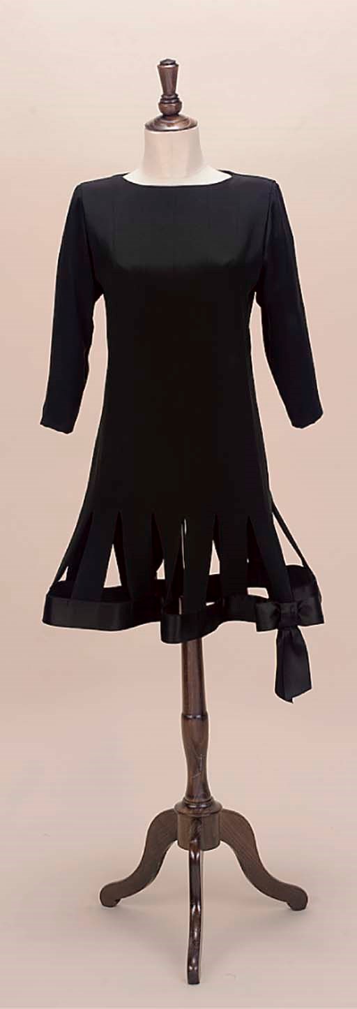 A BLACK SILK CREPE COCKTAIL DRESS
