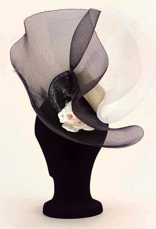 A COLLECTION OF HATS AND A BELT