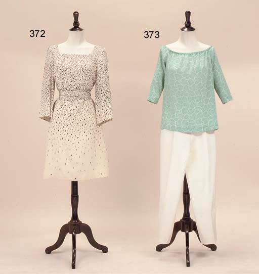 A COLLECTION OF BLOUSES, TROUSERS AND FURTHER ITEMS