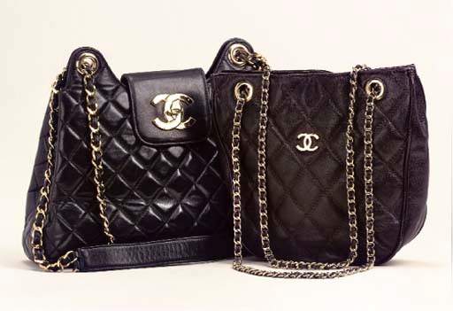 TWO QUILTED SHOULDER BAGS BY CHANEL, AND A CLUTCH BY CARTIER