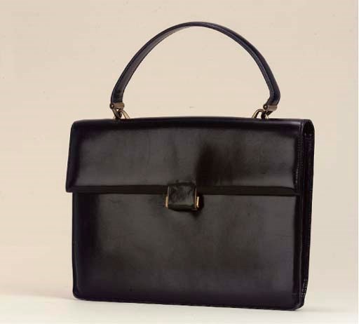 A BLACK LEATHER HANDBAG, GUCCI 1957