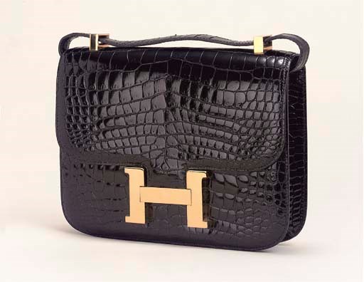 A BLACK CROCODILE 'CONSTANCE' BAG, HERMÈS