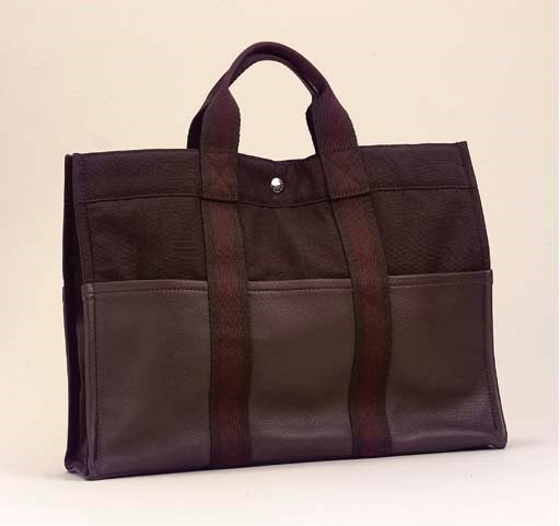 A CHOCOLATE BROWN 'TOTO' BAG, HERMÈS