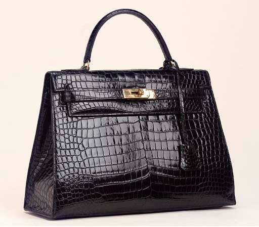 A BLACK CROCODILE KELLY BAG, HERMÈS
