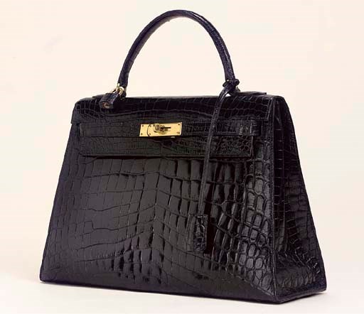 A BLACK CROCODILE KELLY BAG, HERMÈS