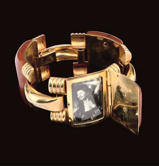 A BRACELET OF GILT METAL AND AMBER-COLOURED LINKS, NITA RAYA