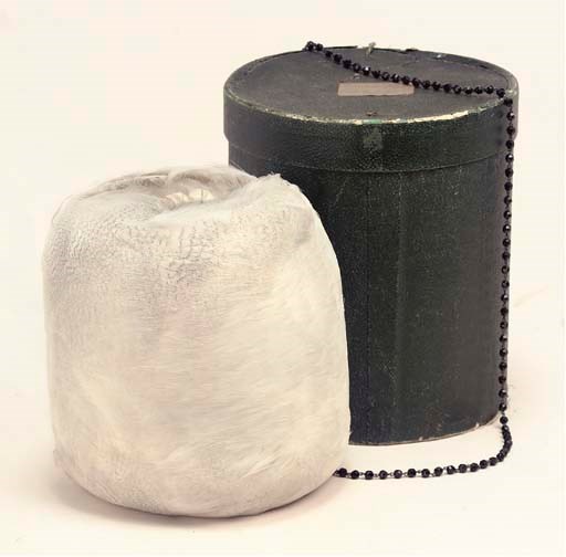 A LADIES' WHITE ALBATROSS MUFF
