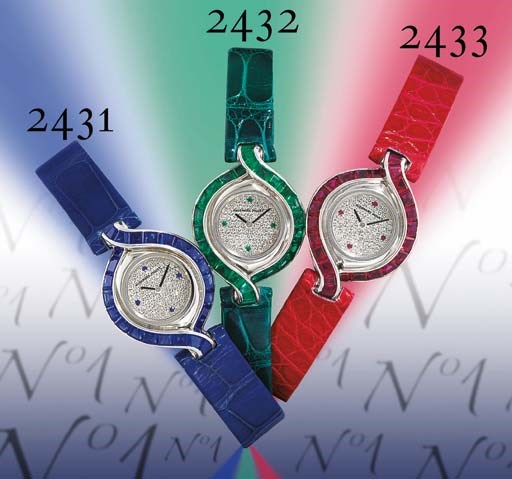 AUDEMARS PIGUET. A LADY'S 18K WHITE GOLD, DIAMOND AND RUBY-SET OVAL WRISTWATCH