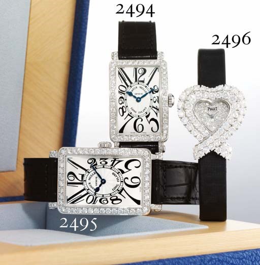 PIAGET. A FINE LADY'S 18K WHITE GOLD AND DIAMOND-SET HEART-SHAPED WRISTWATCH