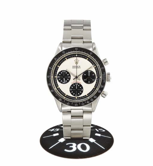 ROLEX. A STAINLESS STEEL CHRONOGRAPH WRISTWATCH WITH BRACELET