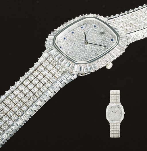 AUDEMARS PIGUET. A RARE AND IMPRESSIVE 18K WHITE GOLD, DIAMOND AND SAPPHIRE-SET CUSHION-SHAPED WRISTWATCH WITH BRACELET