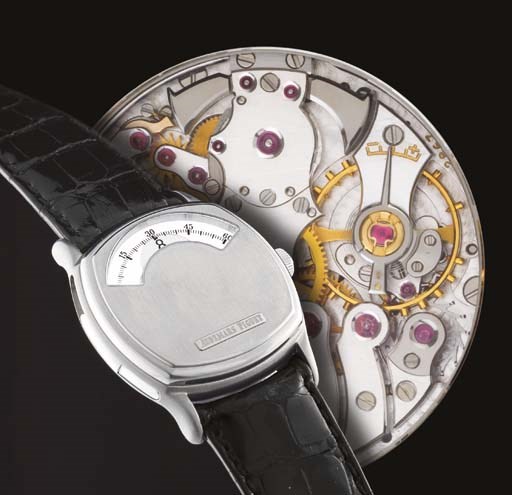 AUDEMARS PIGUET. A VERY RARE LIMITED EDITION TITANIUM CUSHION-SHAPED WANDERING HOUR MINUTE REPEATING WRISTWATCH