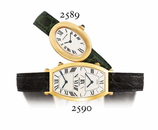 CARTIER. A LADY'S 18K GOLD OVAL WRISTWATCH