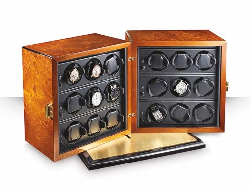 SCATOLA DEL TEMPO. A FINE BROWN BRIAR WOOD AND LEATHER WATCH WINDING BOX