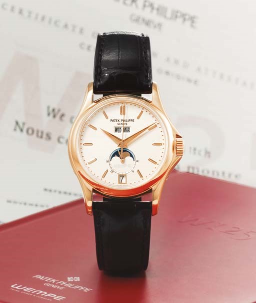 PATEK PHILIPPE. A VERY FINE AND RARE LIMITED EDITION 18K PINK GOLD AUTOMATIC ANNUAL CALENDAR WRISTWATCH WITH CENTRE SECONDS, 24 HOUR INDICATION AND PHASES OF THE MOON