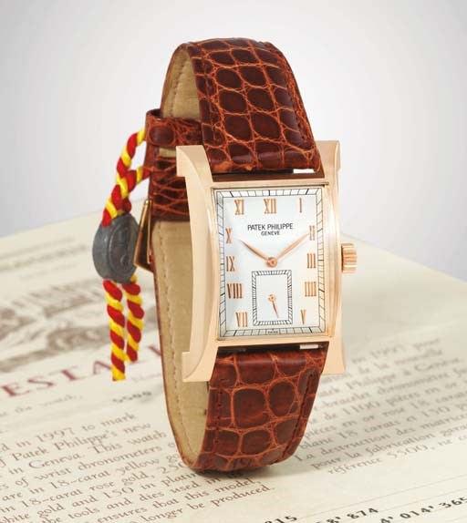 PATEK PHILIPPE. A FINE AND RARE LIMITED EDITION 18K PINK GOLD FLARED RECTANGULAR WRISTWATCH