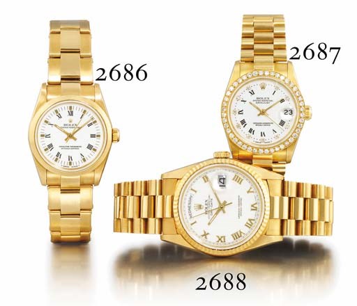 ROLEX. A LADY'S 18K GOLD AND DIAMOND-SET AUTOMATIC WRISTWATCH WITH CENTRE SECONDS, DATE AND BRACELET