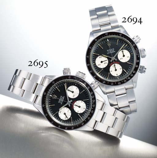 ROLEX. A STAINLESS STEEL CHRONOGRAPH WRISTWATCH WITH BRACELET