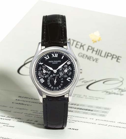 PATEK PHILIPPE. A FINE AND VERY RARE PLATINUM AUTOMATIC PERPETUAL CALENDAR WRISTWATCH WITH PHASES OF THE MOON AND SPECIAL DIAL