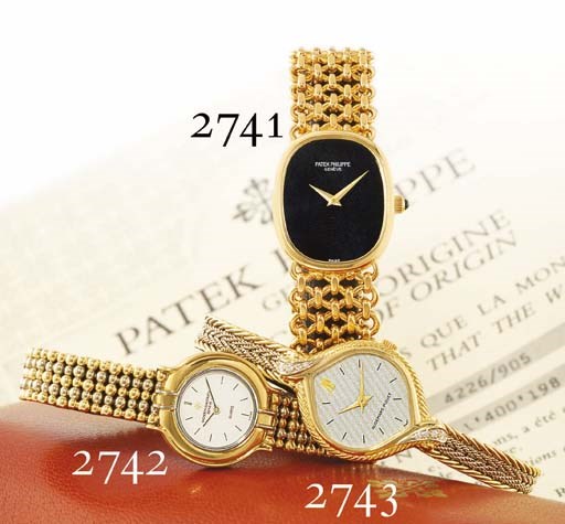 AUDEMARS PIGUET. A LADY'S 18K GOLD AND DIAMOND-SET OVAL WRISTWATCH WITH BRACELET