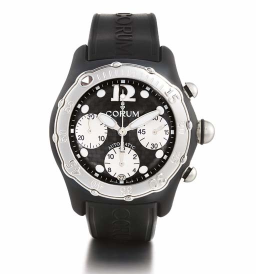 CORUM. A STAINLESS STEEL AND RUBBER TONNEAU-SHAPED AUTOMATIC CHRONOGRAPH WRISTWATCH WITH DATE