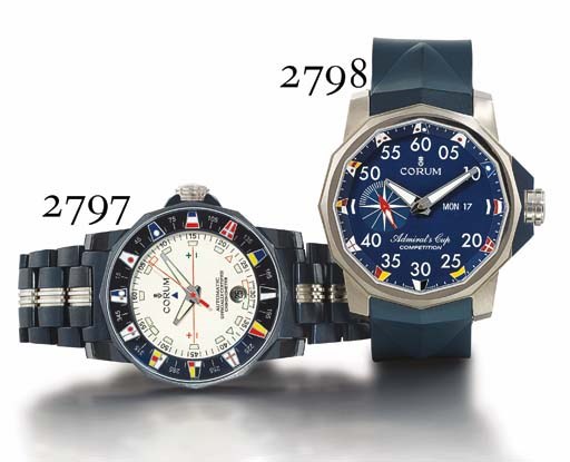 CORUM. A BLUED STEEL DODECAHEDRAL AUTOMATIC WRISTWATCH WITH CENTRE SECONDS, DATE AND BRACELET