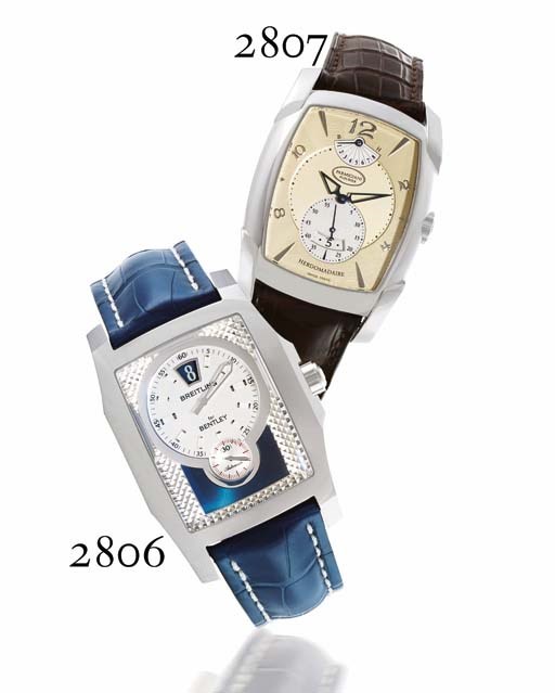 PARMIGIANI. A FINE STAINLESS STEEL TONNEAU-SHAPED EIGHT-DAY POWER RESERVE WRISTWATCH WITH DATE