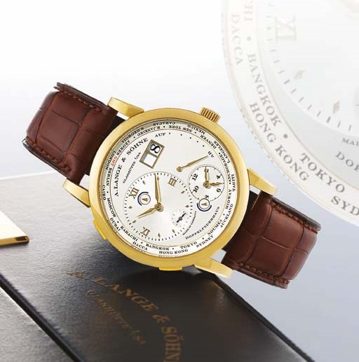 A. LANGE & SÖHNE. A FINE AND RARE OVERSIZED 18K GOLD DUAL TIME ZONE
AND WORLD TIME WRISTWATCH WITH DATE, POWER RESERVE AND DAY AND NIGHT INDICATION