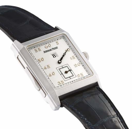 AUDEMAR PIGUET. A FINE PLATINUM RECTANGULAR JUMP HOUR MINUTE REPEATING WRISTWATCH