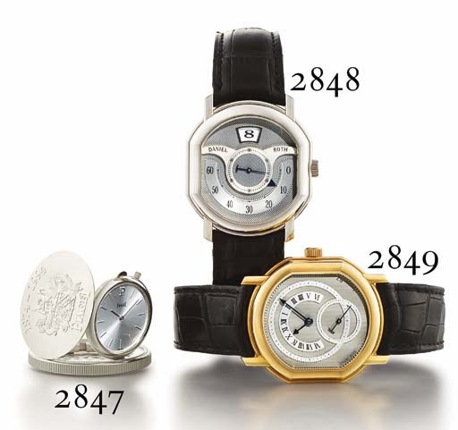 DANIEL ROTH. A RARE LIMITED EDITION 18K WHITE GOLD TONNEAU-SHAPED AUTOMATIC JUMP HOUR WRISTWATCH