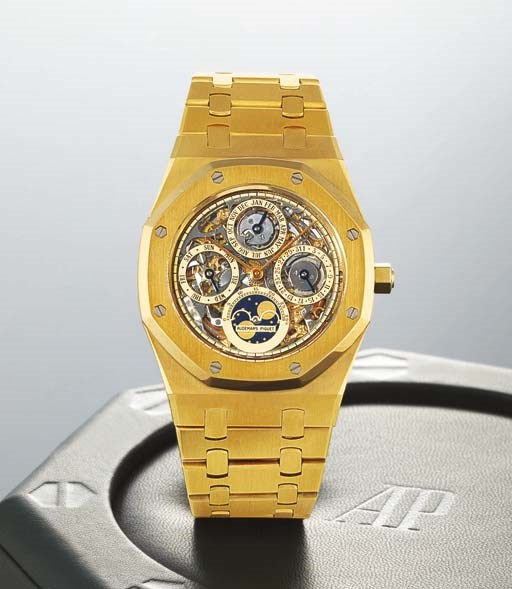 AUDEMARS PIGUET. A FINE 18K GOLD SKELETONISED PERPETUAL CALENDAR WRISTWATCH WITH PHASES OF THE MOON AND BRACELET