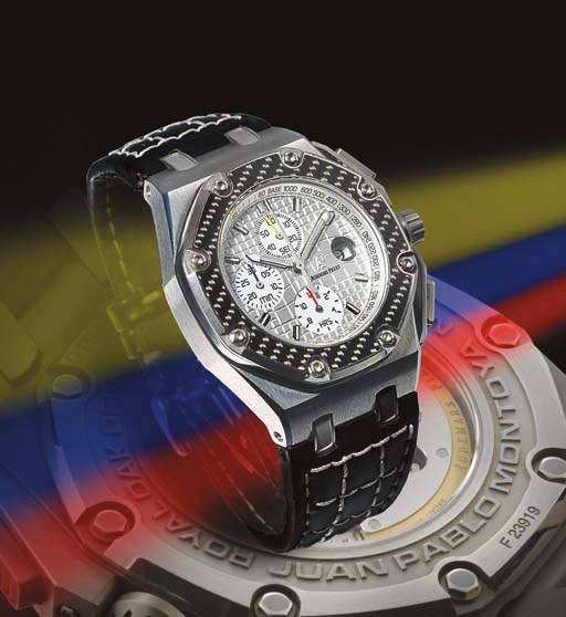 AUDEMARS PIGUET. A LIMITED EDITION TITANIUM AUTOMATIC CHRONOGRAPH WRISTWATCH WITH DATE