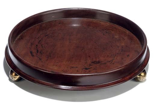 A MAHOGANY LARGE BOTTLE-STAND