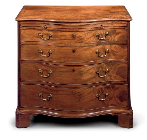 A GEORGE III MAHOGANY SERPENTINE CHEST