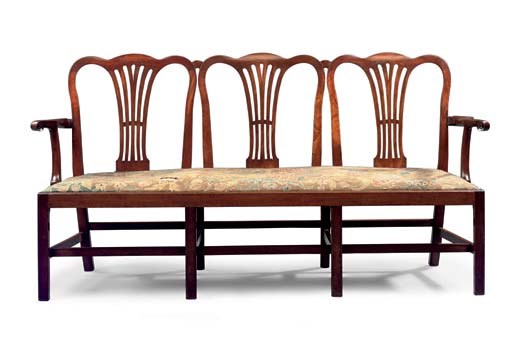 A GEORGE III MAHOGANY TRIPLE CHAIR-BACK SETTEE