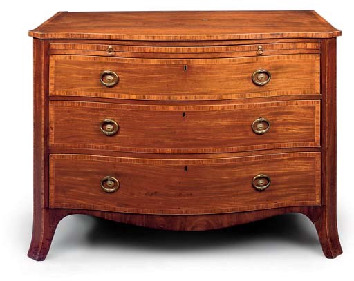 A GEORGE III MAHOGANY SERPENTINE COMMODE