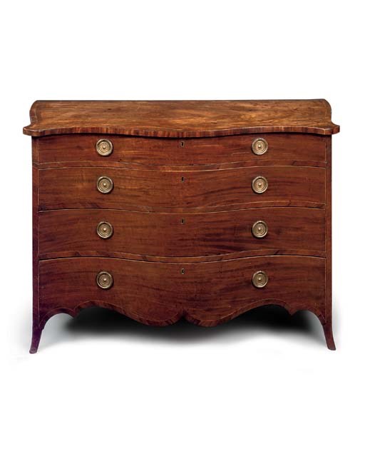 A GEORGE III MAHOGANY SERPENTINE CHEST