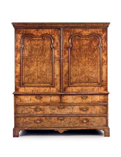 AN 'ANGLO-DUTCH' WALNUT LARGE CLOTHES-PRESS