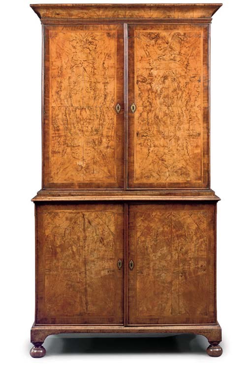 A GEORGE I WALNUT CABINET