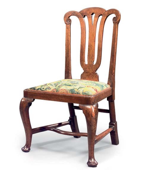 A GEORGE I WALNUT SIDE CHAIR