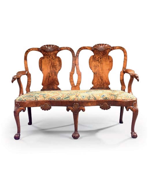 A GEORGE I WALNUT DOUBLE CHAIR-BACK SETTEE