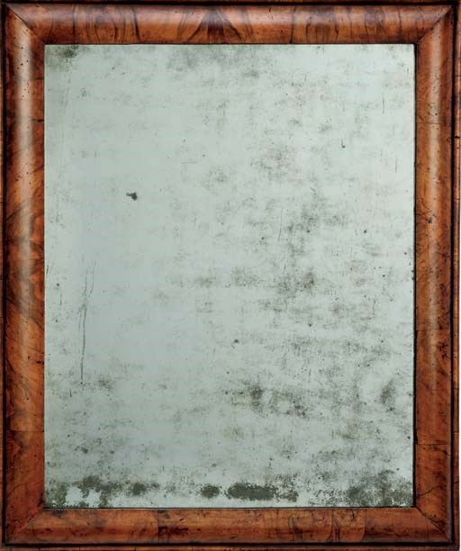 A GEORGE I WALNUT MIRROR
