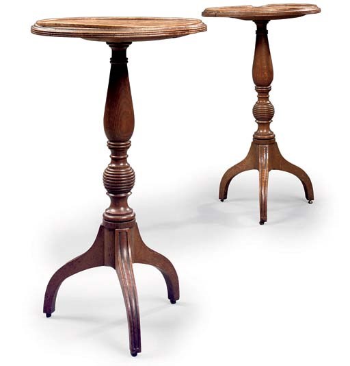 A PAIR OF REGENCY OAK CIRCULAR OCCASIONAL TABLES