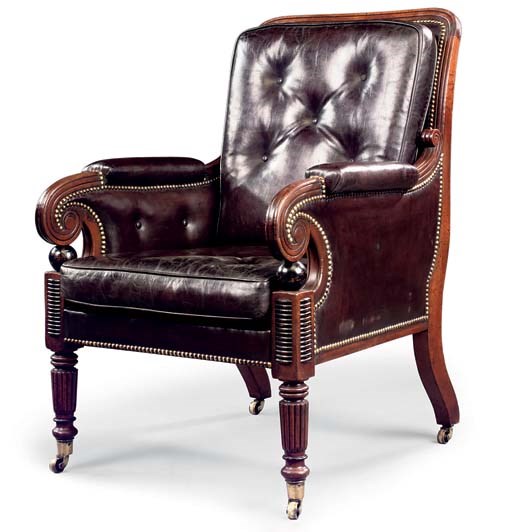 A REGENCY MAHOGANY AND EBONISED BERGERE